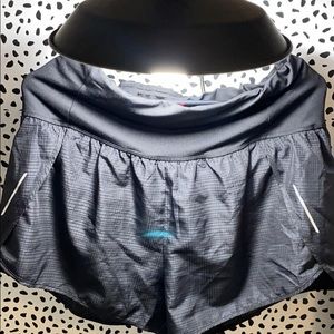 Black running shorts with drawstring top